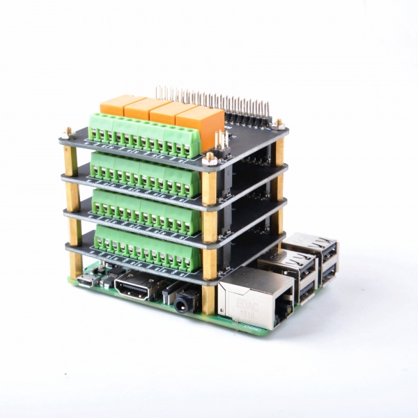 Four 52Pi EP-0099 boards stacked on a Raspberry Pi for 16 channels